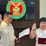UP President Angelo Jimenez administers the oath-taking of Faculty Regent Early Sol Gadong. (OFR Photo)